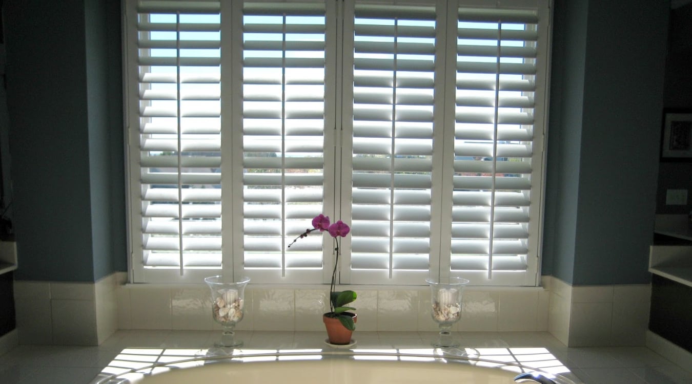 Plantation shutters in a bathroom